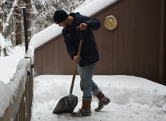 Photo of someone shoveling snow
