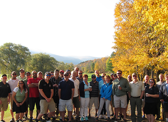 Photo of the enitre Homestead Staff at a golf course